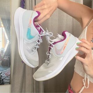 Nike Kids White Sneakers with Iridescent Swoosh and Purple Trim